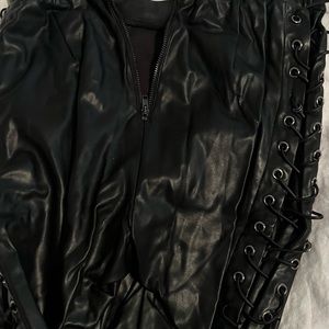 Line and dot leather tie up pants